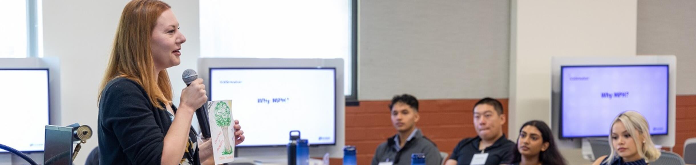 Student presenting to other students